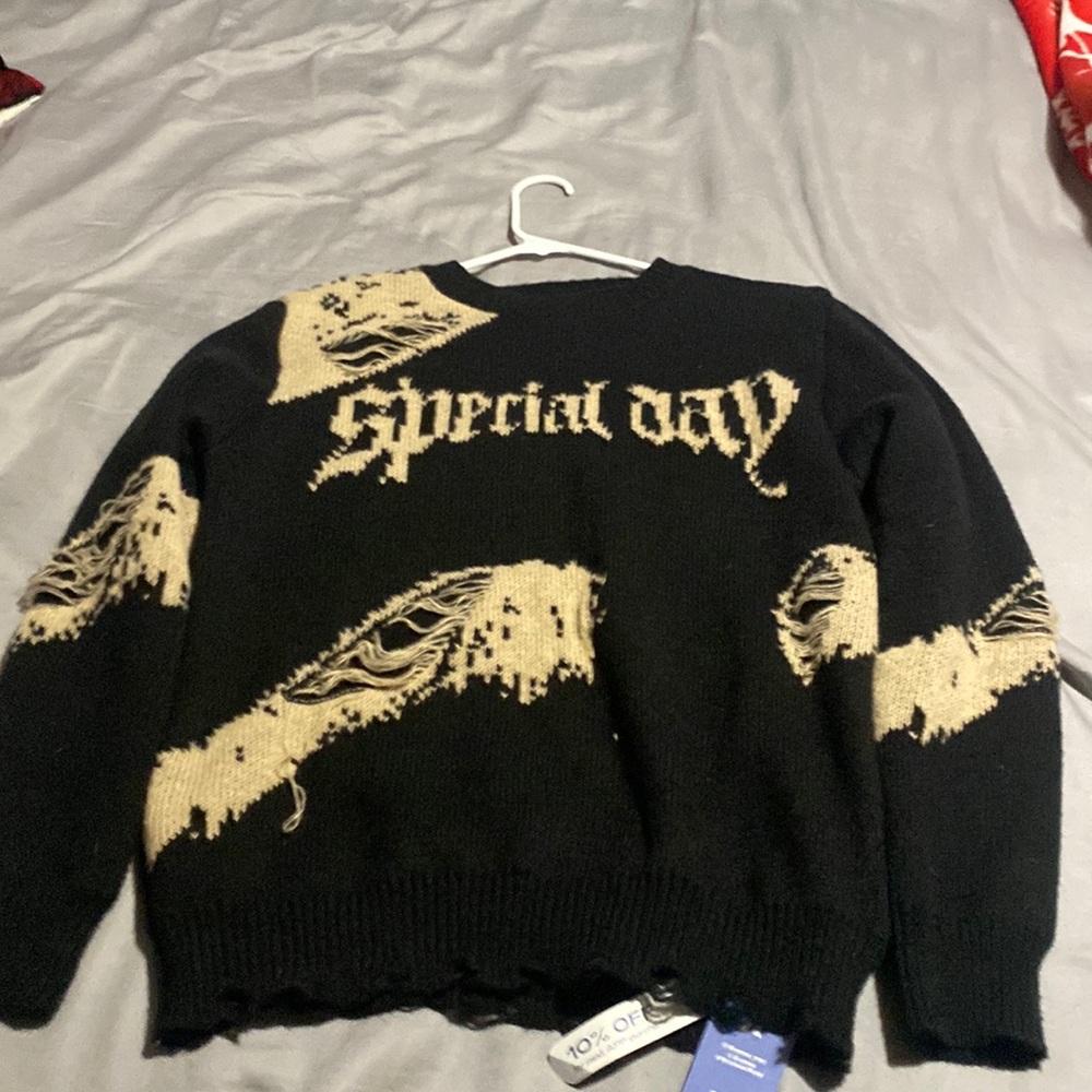 selling a brand new sweater never worn with tags still on.